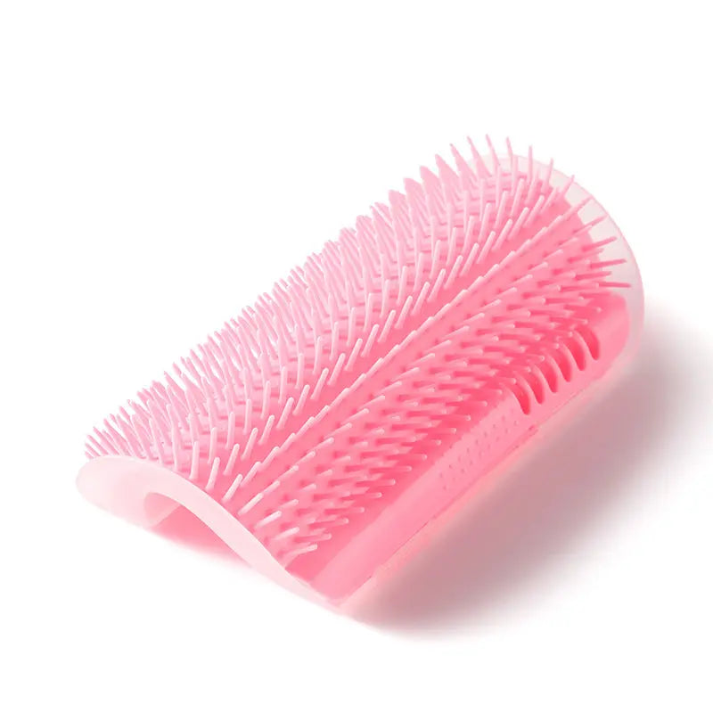 Pink cat corner self groomer on a white background.