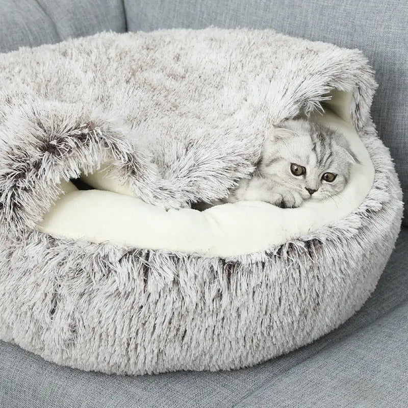 Cozy Calming Cowry Pet Bed by Noblias for dogs and cats, featuring a soft, anti-anxiety design in coffee color.