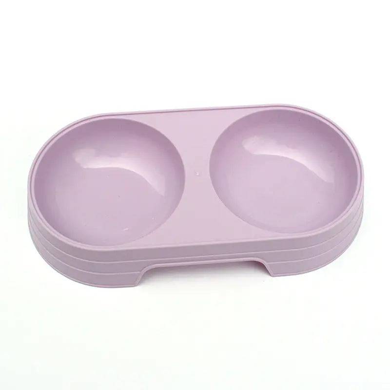 Noblias dual pet bowl set for dogs and cats, with separate food and water bowls in yellow, suitable for pets' feeding needs.