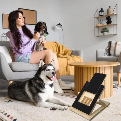 Dog nail scratch board in a living room with two dogs and pet owner showing home use lifestyle scene