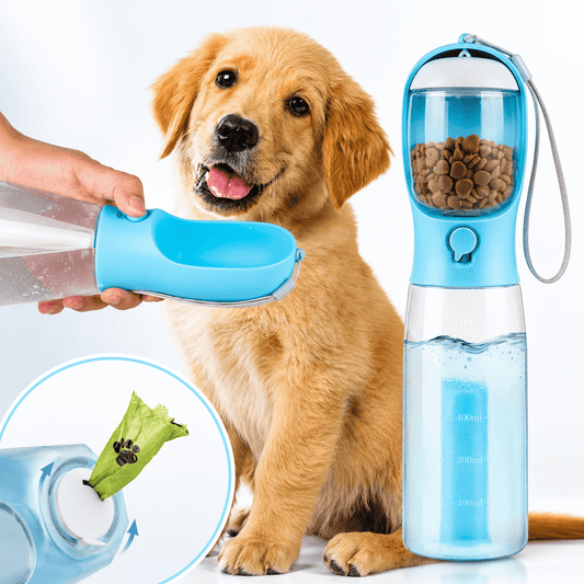 Light blue Noblias 3-in-1 dog water bottle with the drinking trough folded out, a food compartment on top and a poop bag roll inside.