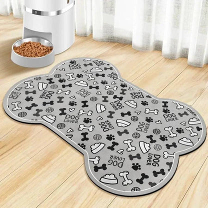 Bone-shaped gray absorbent pet feeding mat covered in a black and white dog icon print.