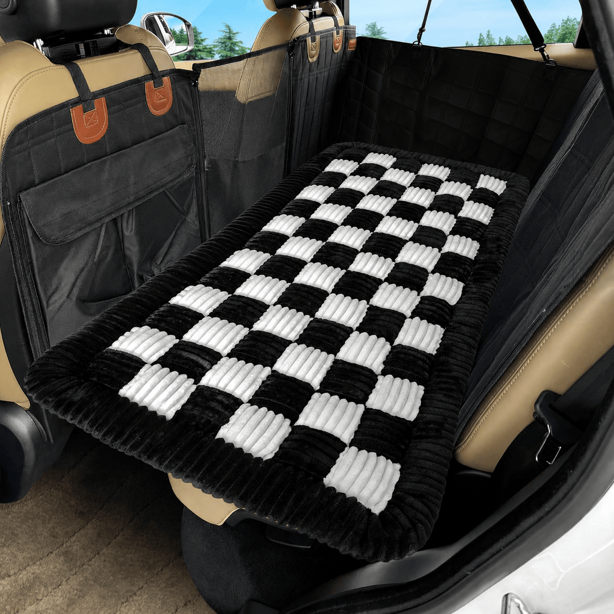 The Noblias back seat dog bed mat in the white small check style, fitted across a rear bench.