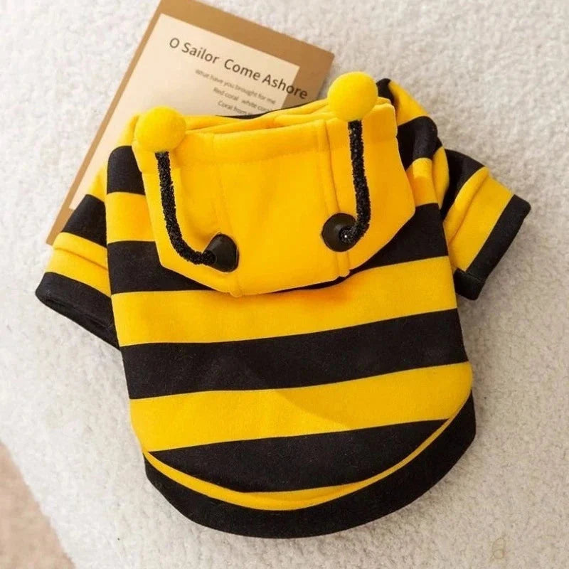 Bee costume hoodie laid flat showing the striped body, sleeves and antenna hood.