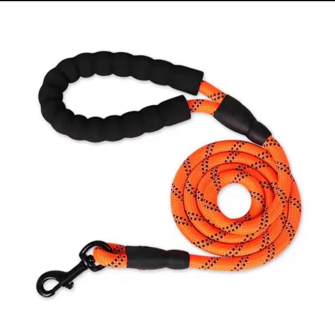Black reflective nylon dog leash with soft padded handle, durable and comfortable for walks, by Noblias.