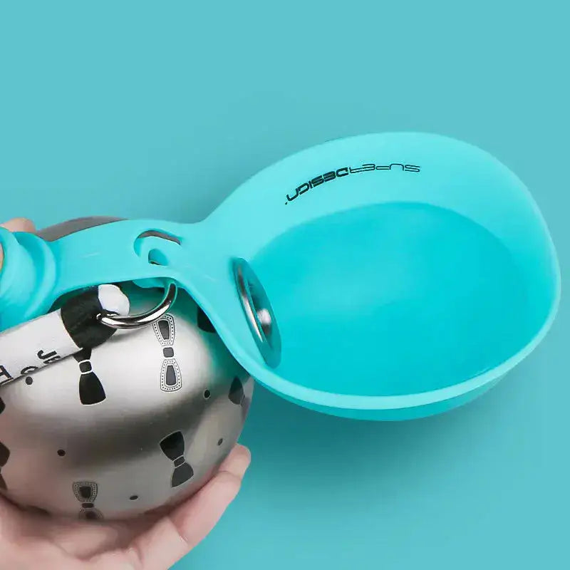 Noblias blue portable dog water bottle with leak-proof design and built-in bowl, ideal for travel and outdoor walks.