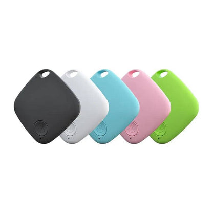 Five Bluetooth pet trackers in black, white, blue, pink and green, each a rounded square tag with a keyring hole.
