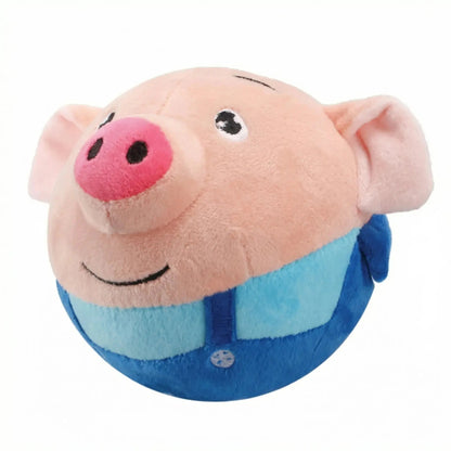 Blue bouncing pig dog toy with blue overalls on a white background.