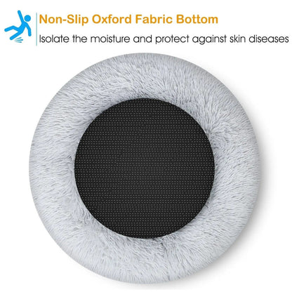 Underside of the donut bed showing the black non-slip Oxford fabric base that keeps out moisture