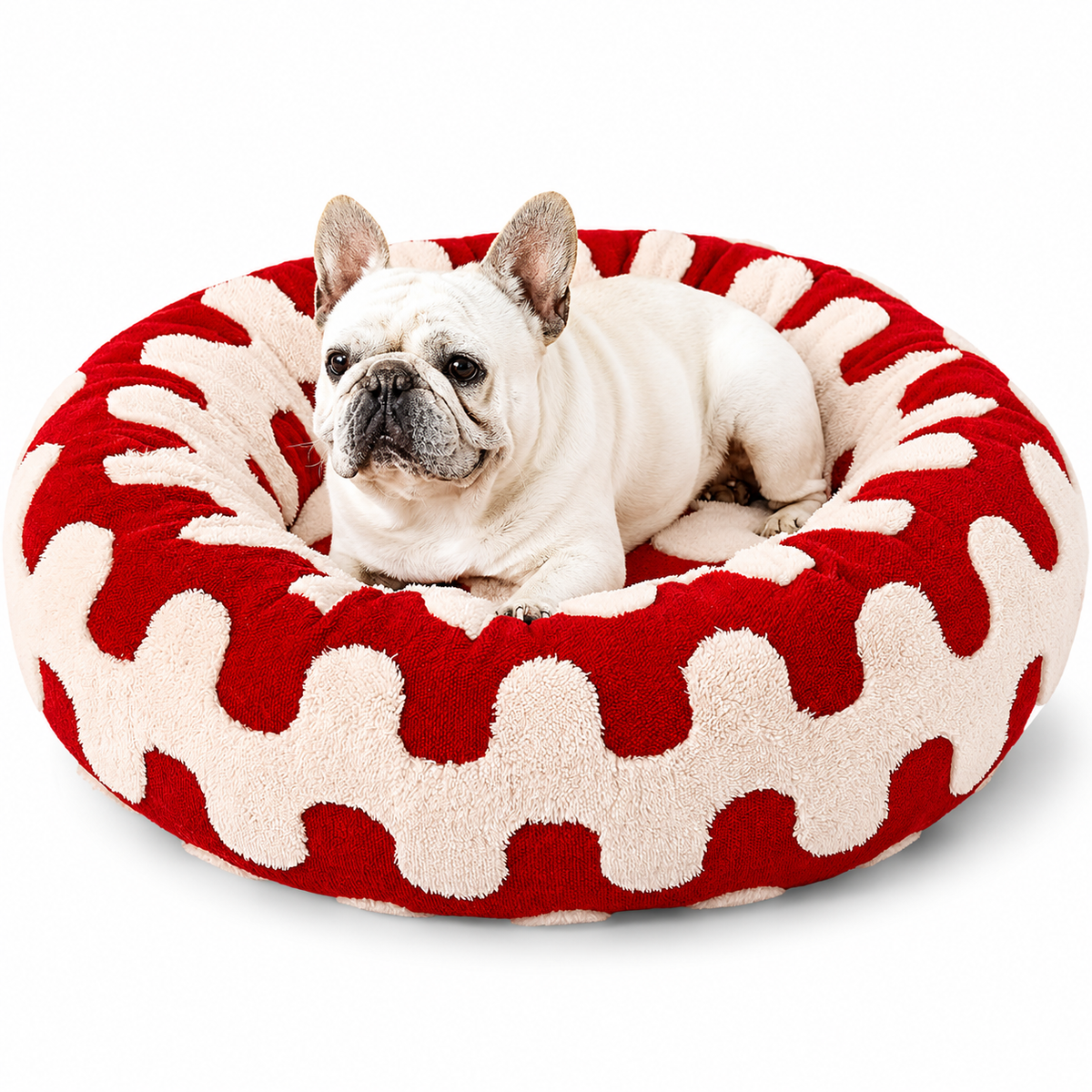 French bulldog lying in the red wave print calming donut dog bed.