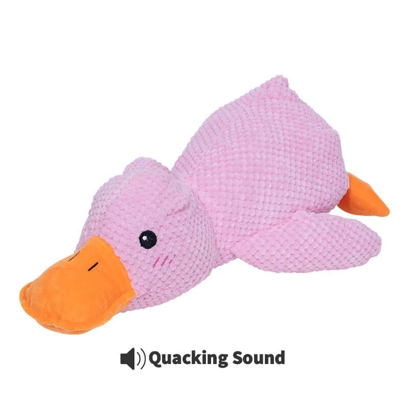 Pink calming duck dog toy with an orange bill on a white background.