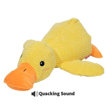 Yellow calming duck dog toy with an orange bill on a white background.