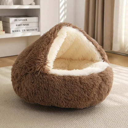 Coffee brown Noblias calming hooded cave pet bed with a cream faux fur lining inside the hood.