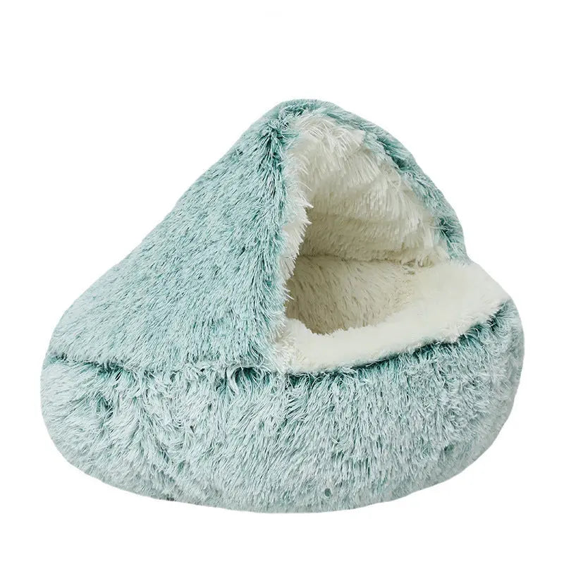 Green Noblias calming hooded cave pet bed shown from the side on a white background.