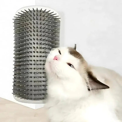 Ragdoll cat rubbing against the gray cat corner self groomer mounted on a wall corner.