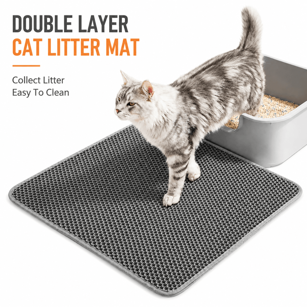 A gray honeycomb litter mat on the floor with a long haired cat stepping off it beside a litter box.