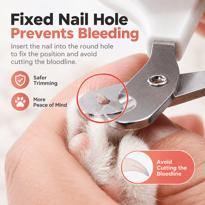 A cat's claw placed through the round nail hole of the cat nail clippers before trimming.