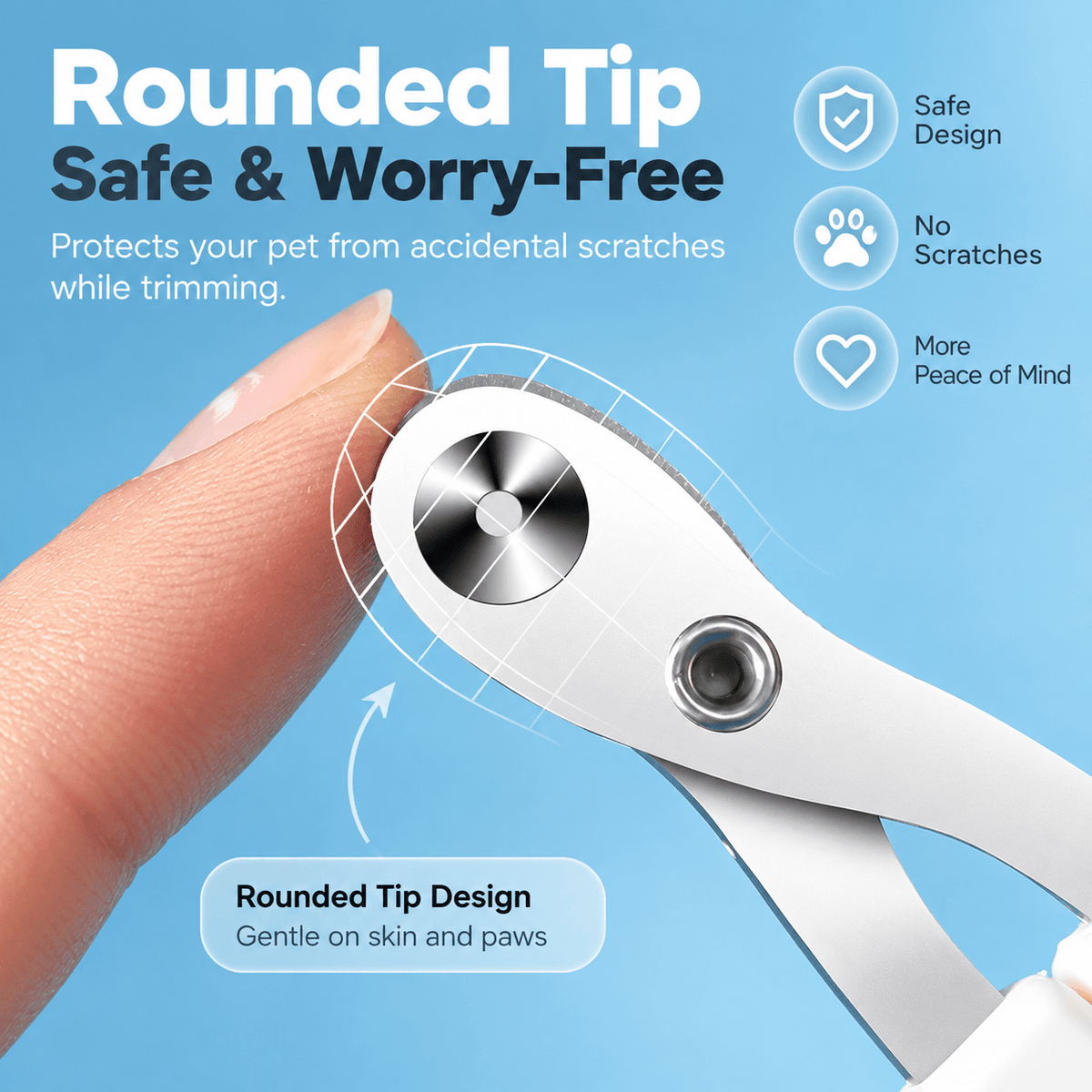 The rounded tip of the cat nail clippers held between two fingers against a blue background.