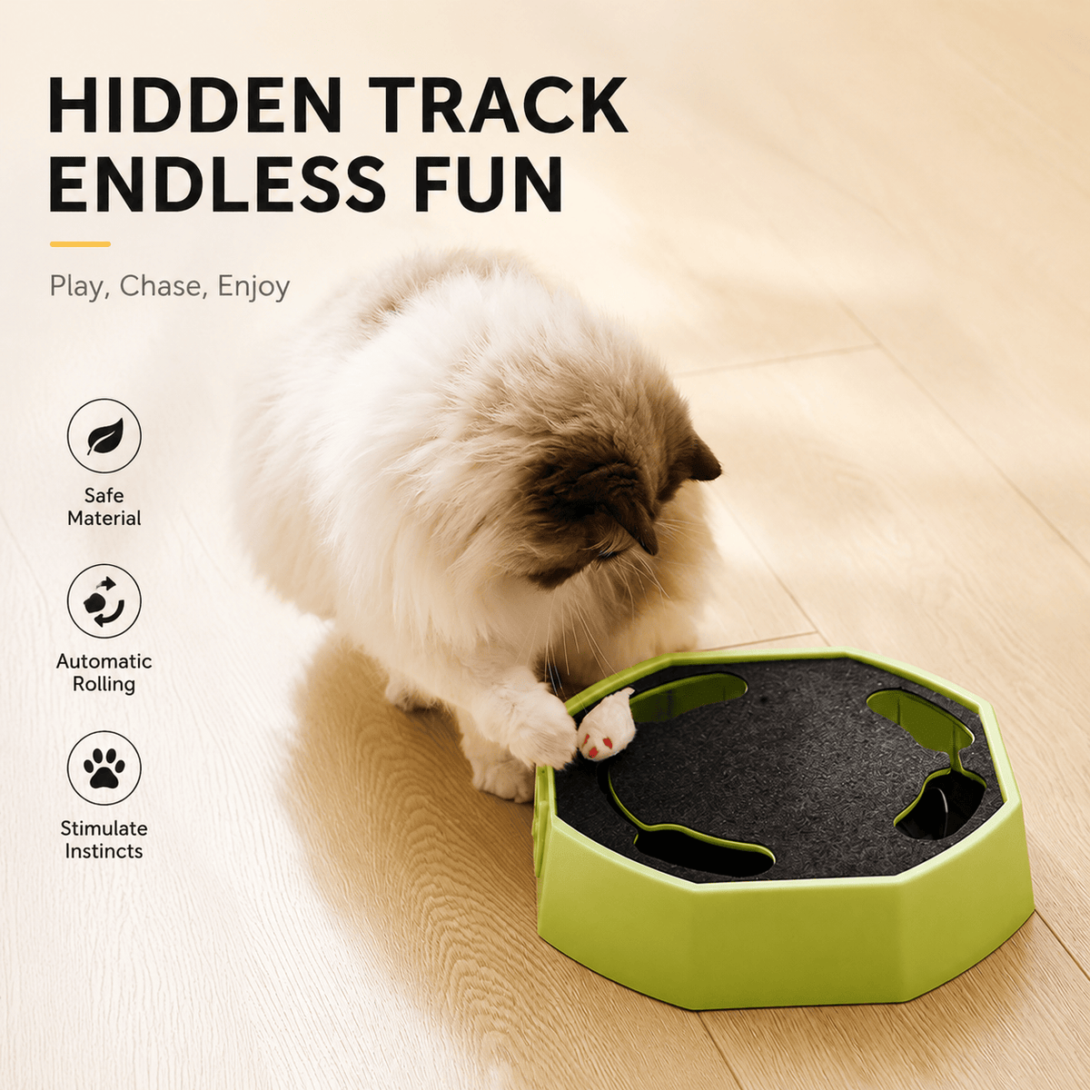 Ragdoll cat pawing at the green cat scratcher toy as the mouse emerges from the hidden track slot