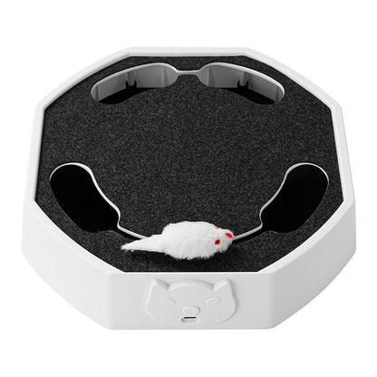 White octagonal cat scratcher toy with black felt pad and plush mouse on a white background