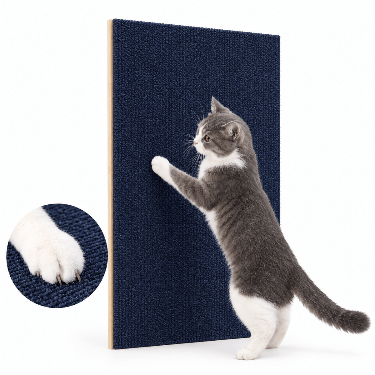 Gray and white cat scratching the navy blue self adhesive cat scratching mat, with a paw close-up of the texture.