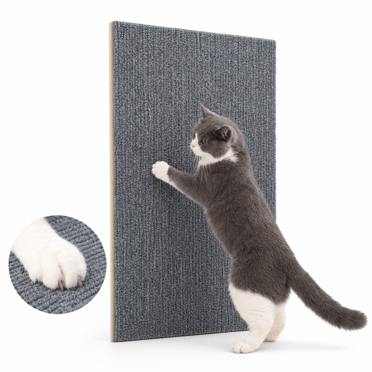 Gray and white cat stretching up to scratch the dark gray self adhesive cat scratching mat, with a paw close-up.
