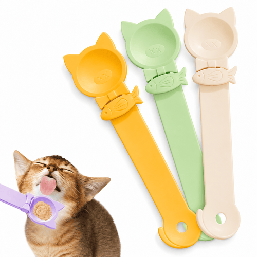 Kitten licking puree from the purple cat-eared Noblias treat squeeze spoon, with the yellow, green and cream spoons standing behind it
