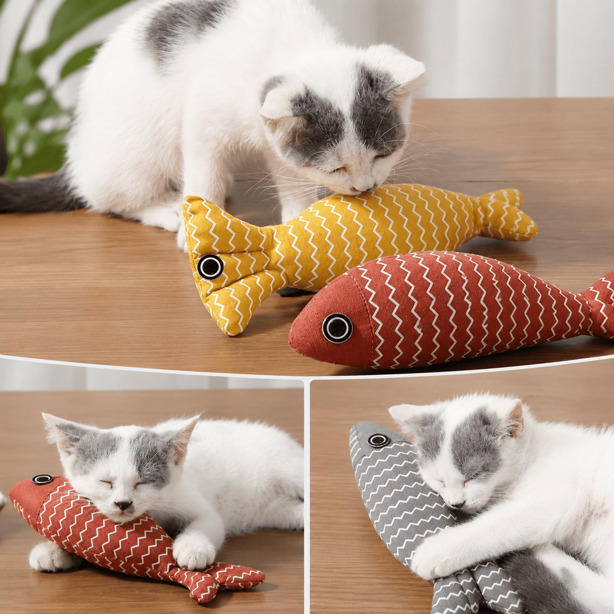 Cat nosing the yellow and red Noblias catnip fish kicker toys on a wooden floor.
