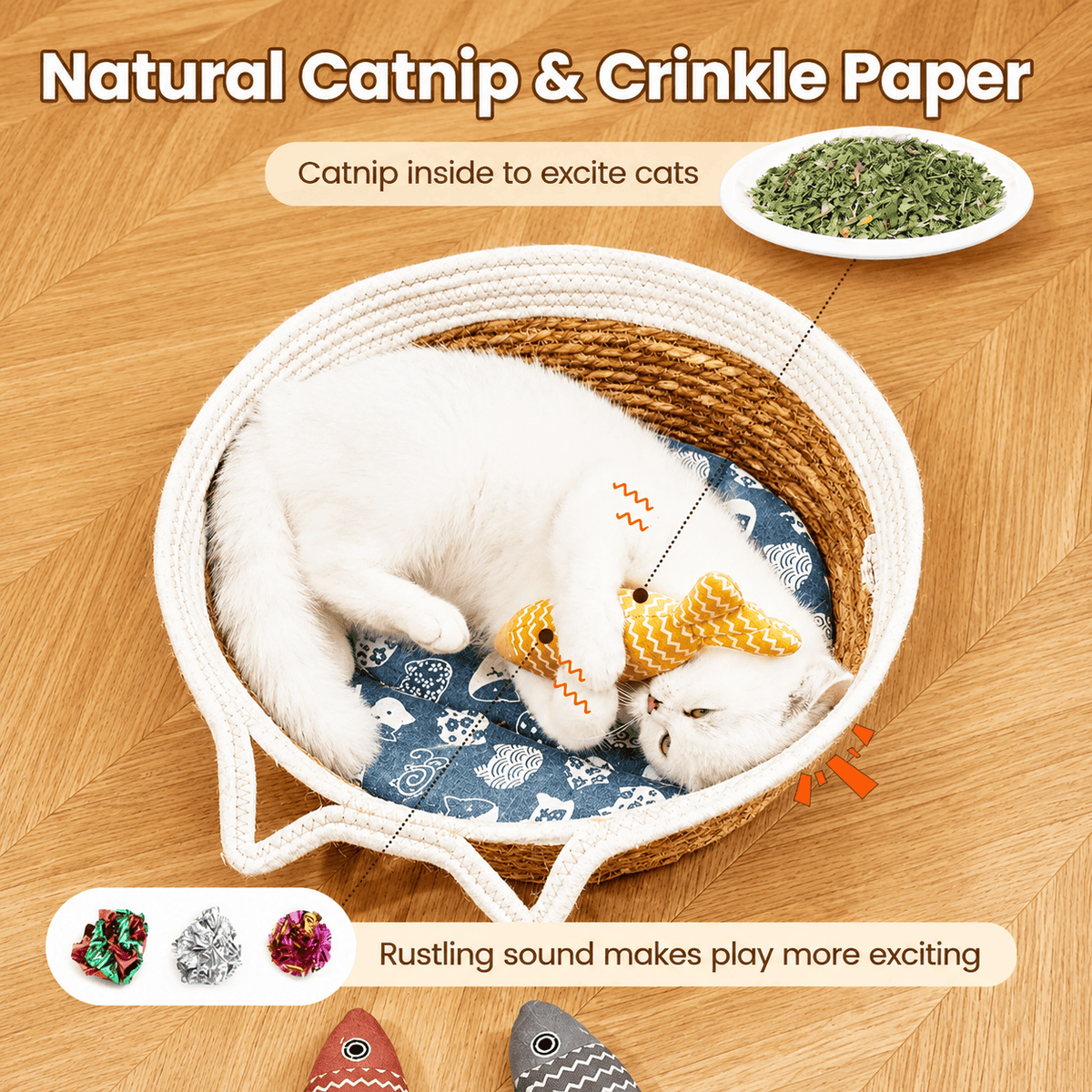 Cat curled in a basket holding the Noblias catnip fish toy, with the catnip and the crinkle paper that makes it rustle.