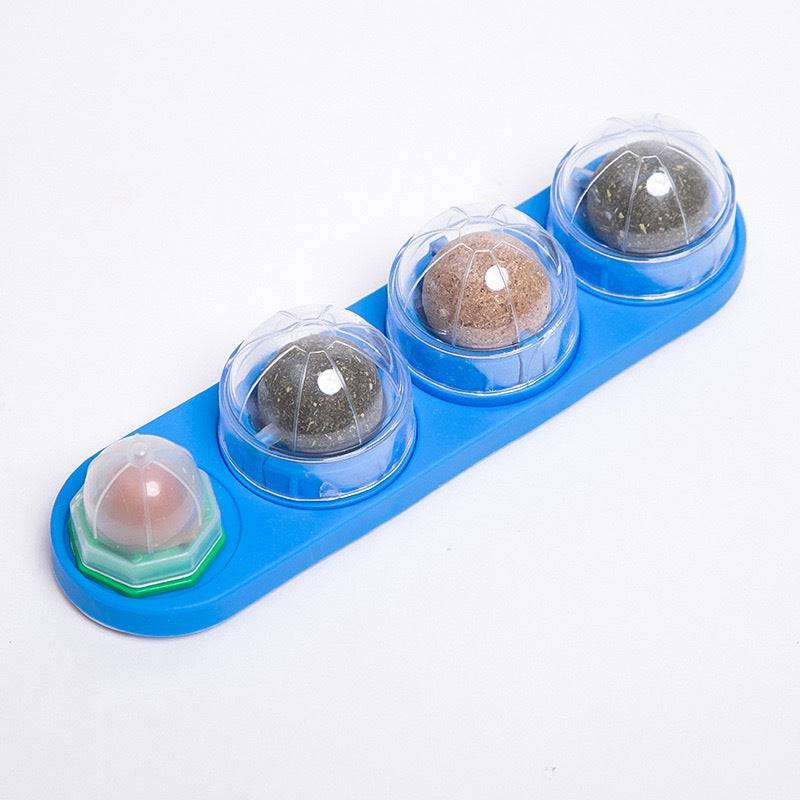Blue Noblias catnip wall ball rail with its four rotating treat balls.