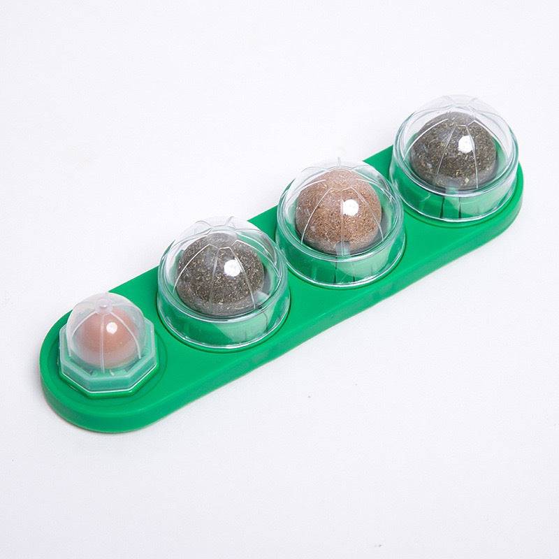 Green Noblias catnip wall ball rail with its four rotating treat balls.