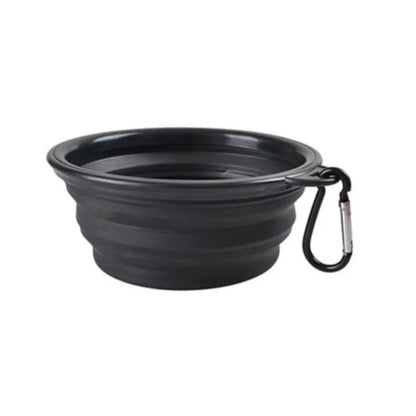 Black Noblias collapsible silicone travel bowl with a black carabiner clip.