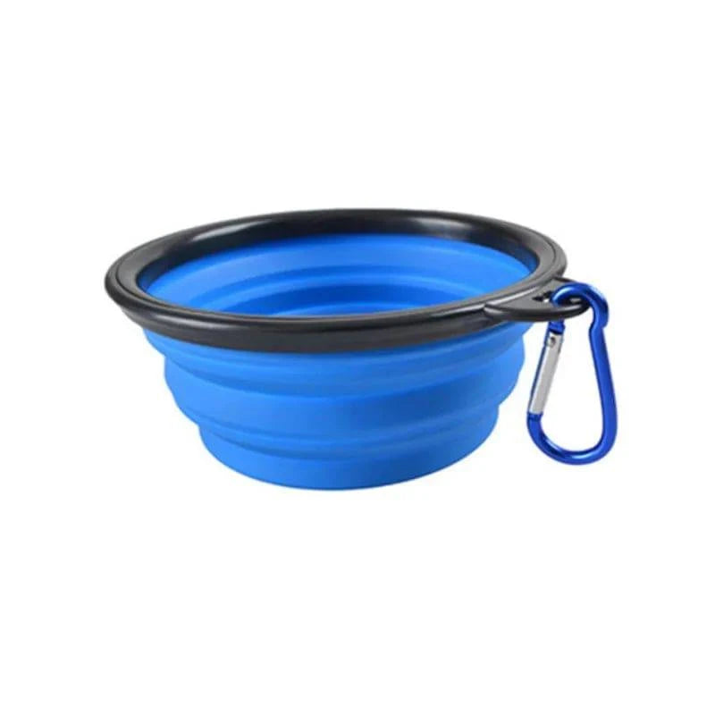 Blue Noblias collapsible silicone travel bowl with a blue carabiner clip.