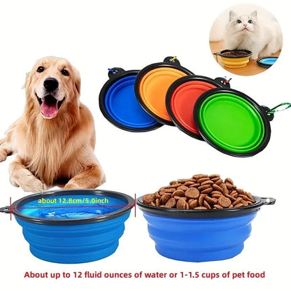 The Noblias collapsible silicone travel bowl filled with water and with dry food, holding up to 12 fluid ounces.