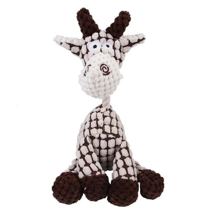 Black and white cow design of the corduroy rope dog toy on a white background.
