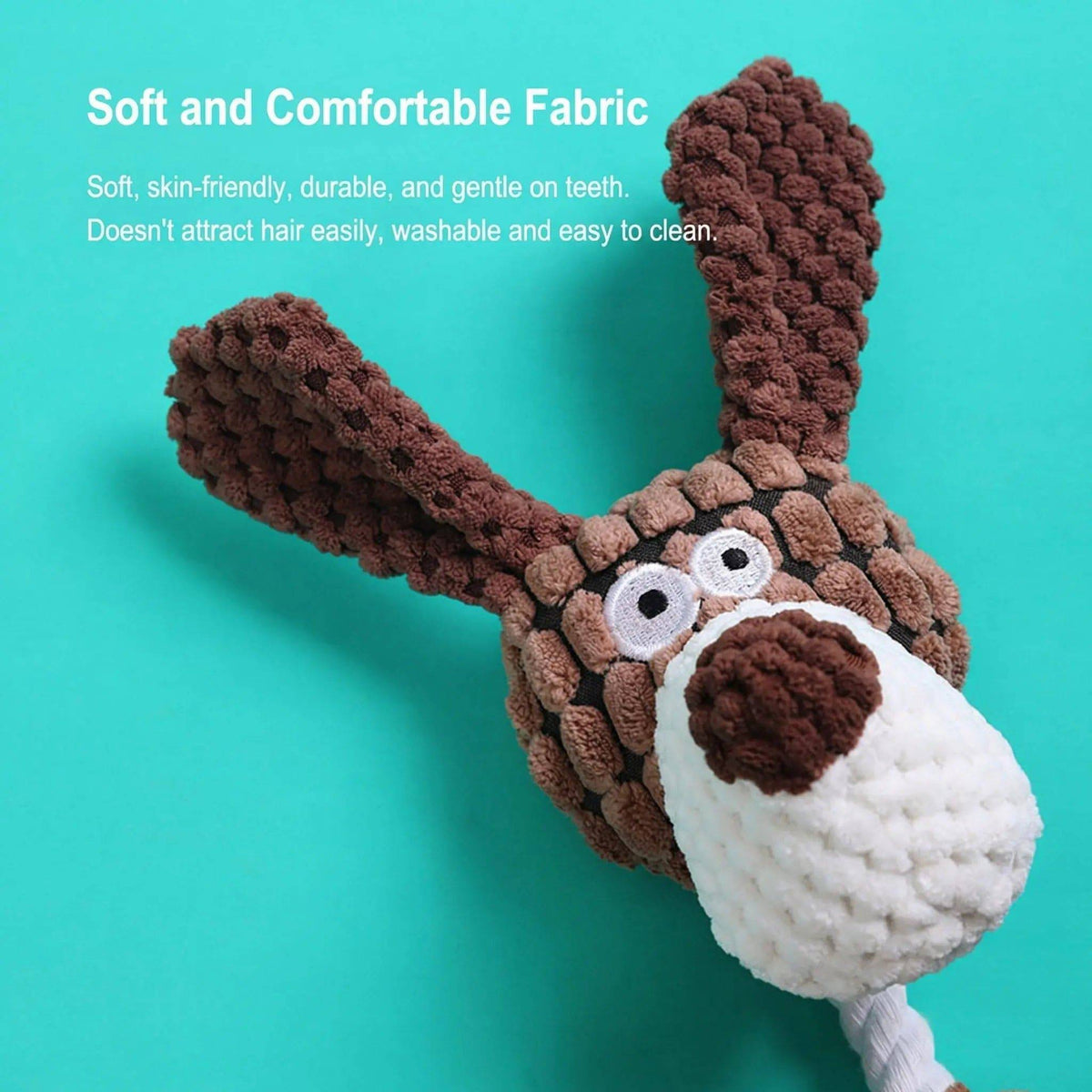 Brown corduroy rope dog toy head with embroidered eyes and a white muzzle, captioned soft and comfortable fabric.