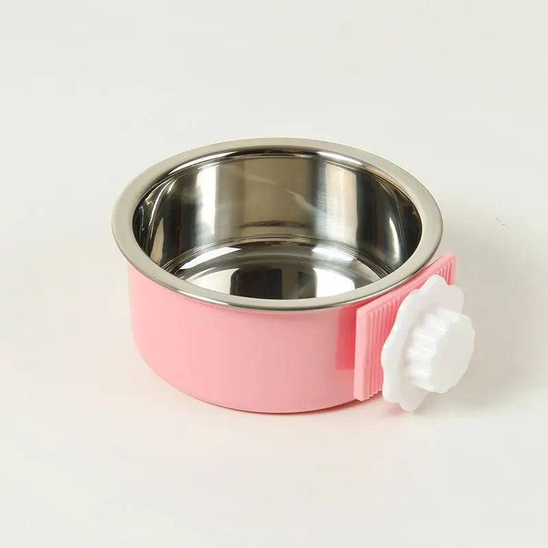 Pink crate dog bowl on a white background with its stainless steel inner bowl seated in the plastic holder and the white hexagon nut attached