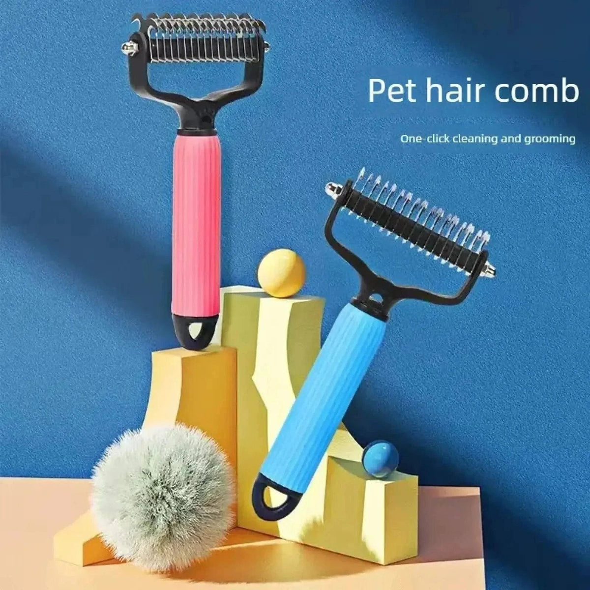 The Noblias detangling comb in blue and pink standing on a blue background with toy blocks, labeled as a pet hair comb.