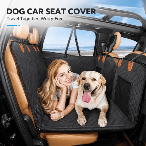 A golden retriever lying on the Noblias dog car seat extender in the back of a car with its owner beside it.