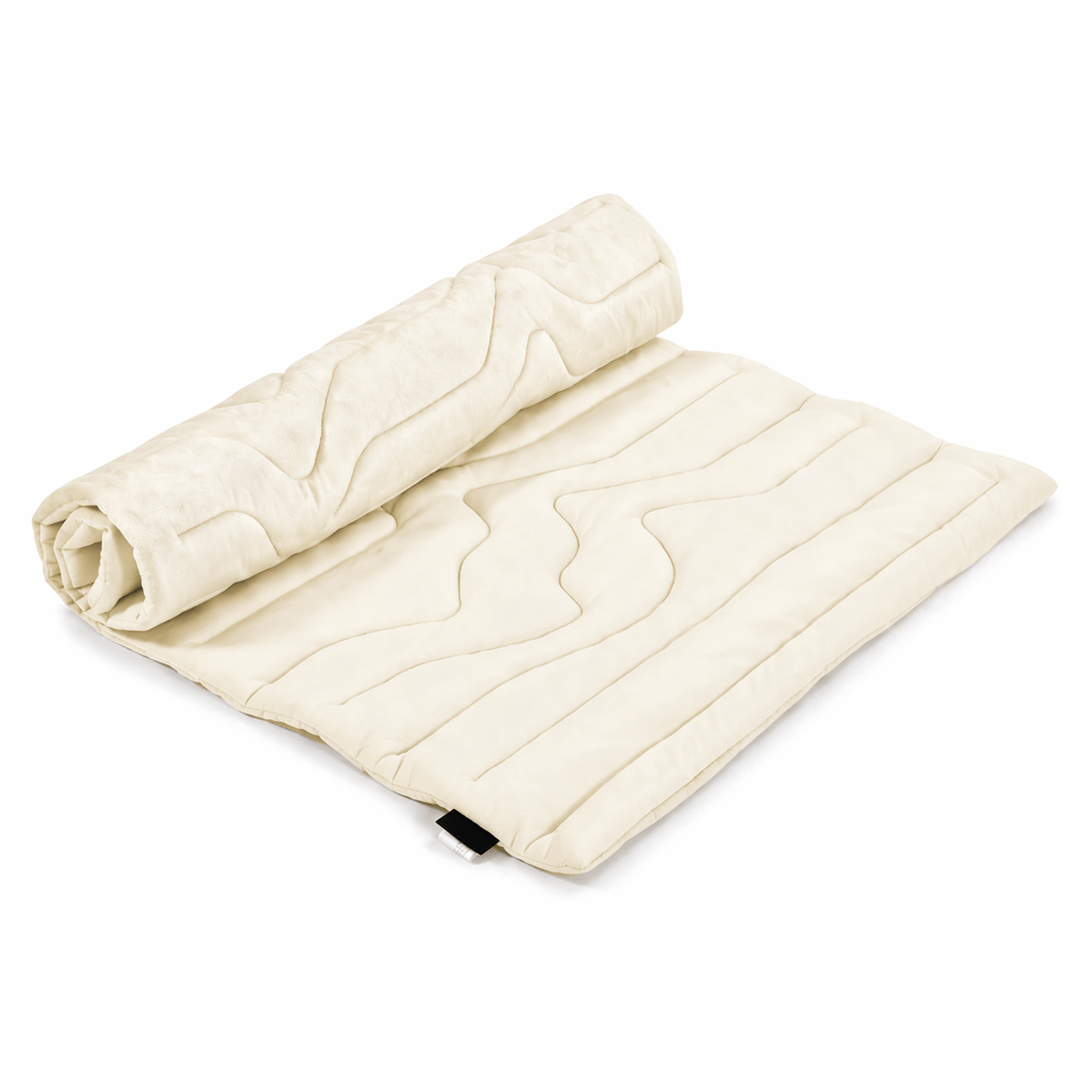 Cream Noblias self cooling dog mat, part rolled to show the quilted cooling face.