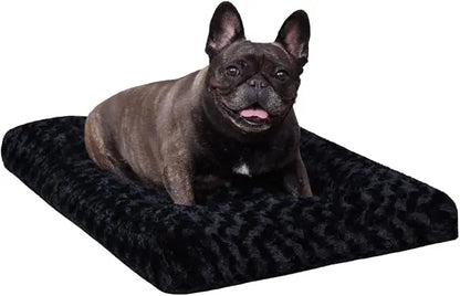 A french bulldog sitting on the black Noblias plush dog crate mat.