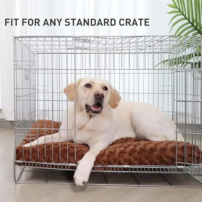 The brown Noblias crate mat fitted inside a wire dog crate with a labrador lying on it.