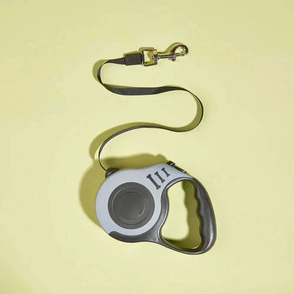 Red and gray Noblias automatic retractable dog leash with a 5m length and one-button brake system, designed for easy control.