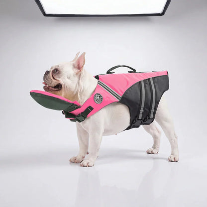 Pink camo dog life jacket shown on a French Bulldog against a plain studio background