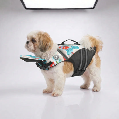 Sailboat print dog life jacket shown on a Shih Tzu against a plain studio background