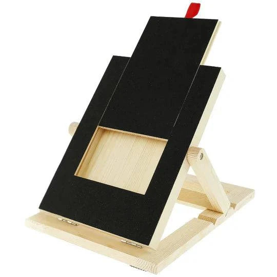 Noblias dog nail scratch board shown on its own, a black sanding panel on an adjustable wooden frame with a treat box at the base.