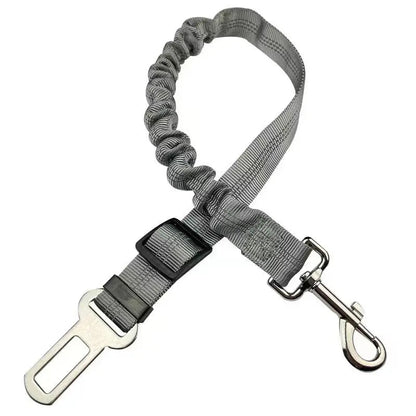 Gray bungee dog seat belt laid flat, showing the braided strap, sliding buckle and swivel hook