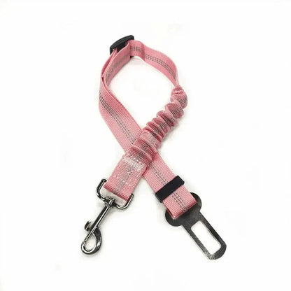 Pink bungee dog seat belt laid flat, showing the braided strap, sliding buckle and swivel hook