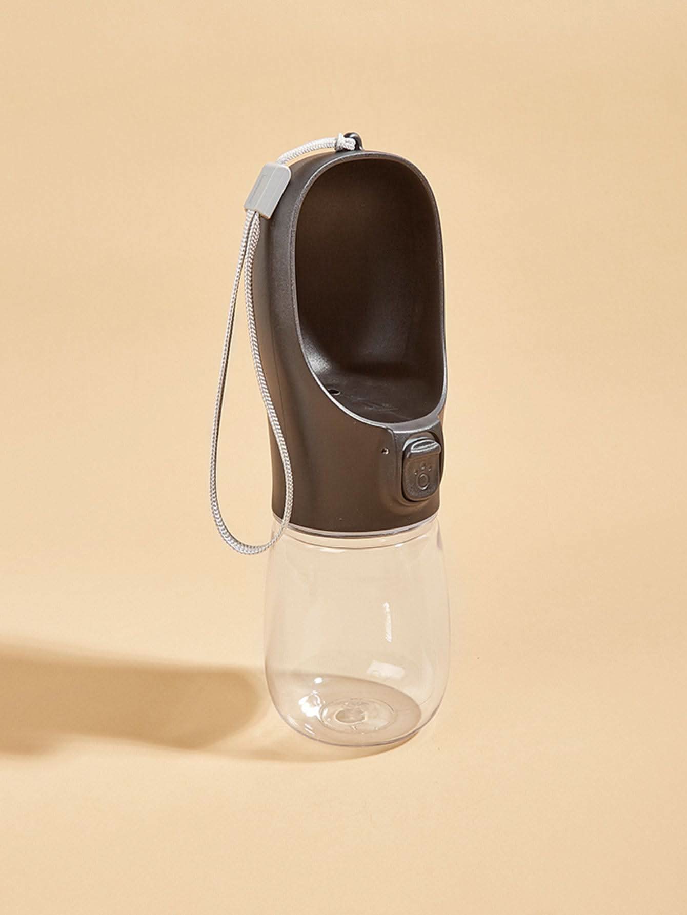 Black Noblias portable dog water bottle with built-in bowl, 550ml capacity, ideal for outdoor pet hydration.