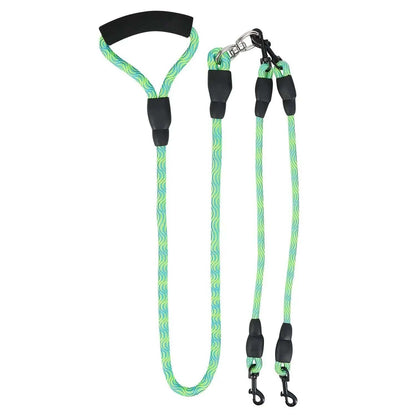 The green double dog leash laid out flat, showing the handle, the splitter and both branches